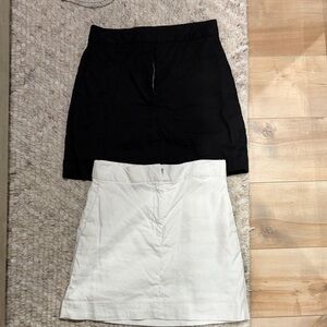 Babaton Black and White Mini Skirt Duo
